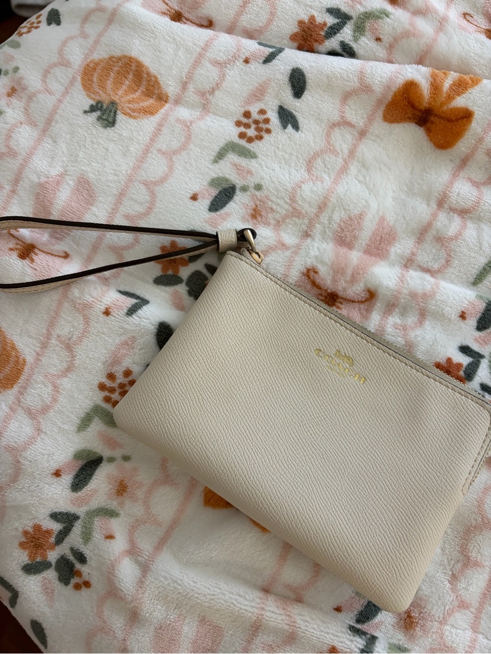 Mini coach wristlet